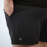 Model wearing Glides Performance Shorts in Black.
