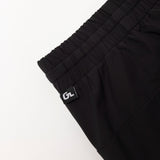 Waist detail of Glides Performance Shorts in Black.