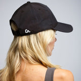 Model wearing Glides Classic Cap in Black.