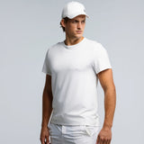 Model wearing Glides Casual T-Shirt in White.